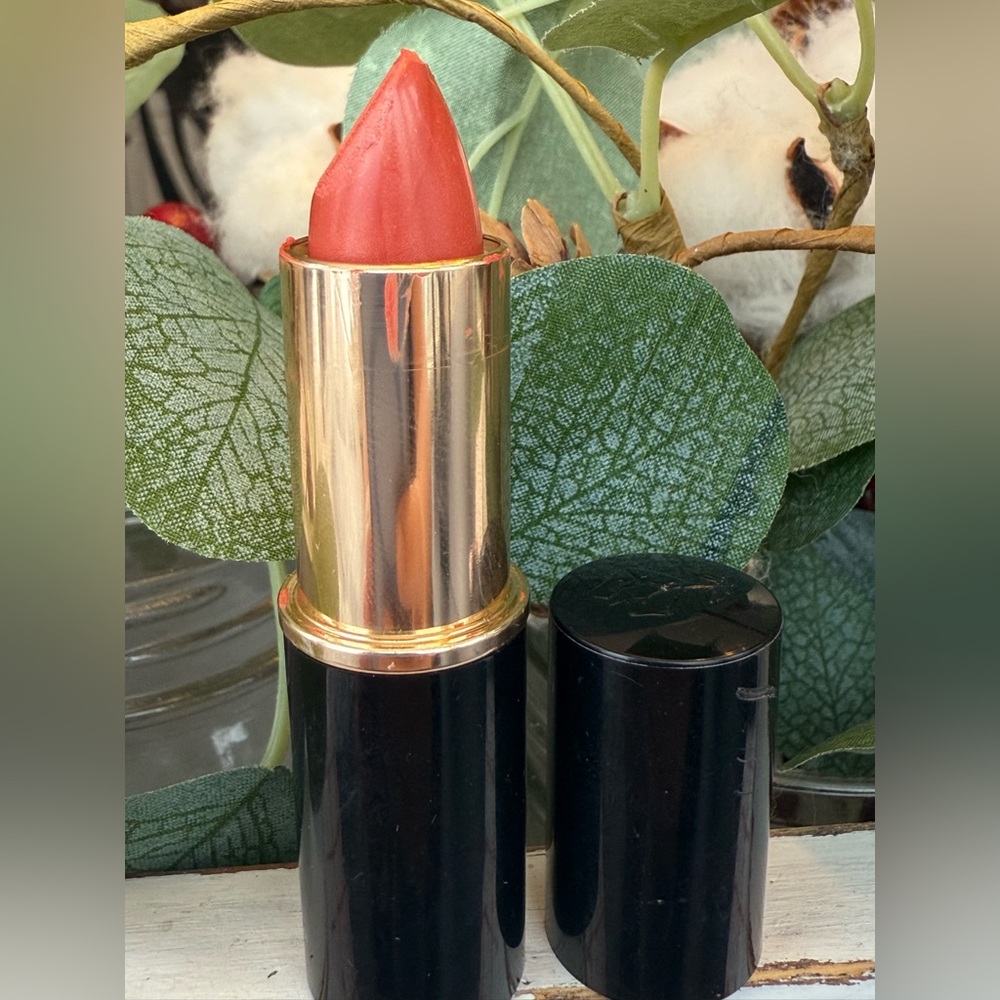 Lancome discontinued Rouge Sensation lipstick in color Sun touched terra